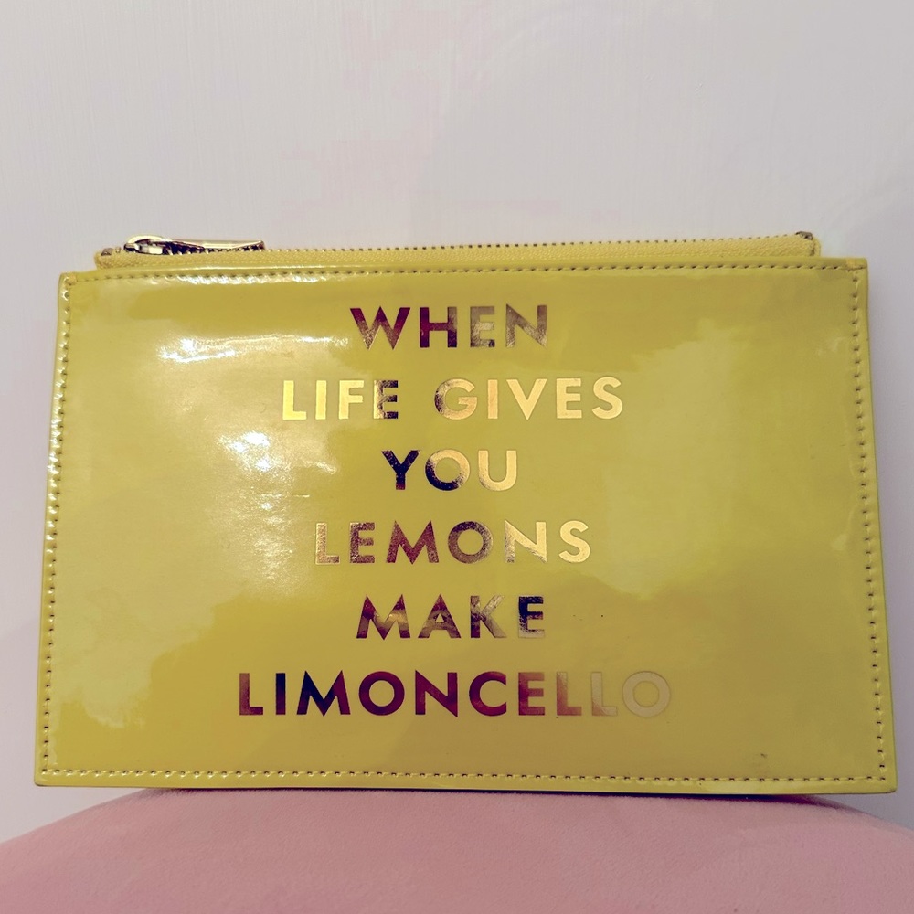 Kate Spade yellow slim clutch